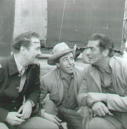 Actor, Fred Carson, Victor Mature during the filming of Escort West